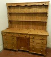 A Victorian pine dresser base