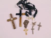 A quantity of crucifixes