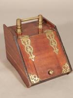 A small Victorian walnut and brass mounted coal scuttle