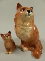 Two Beswick ginger cats