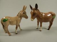 Two Beswick donkeys