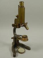 A late 19th/early 20thC brass microscope