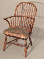 A 19thC ash and elm stickback windsor chair