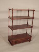 A mahogany four tier what-not