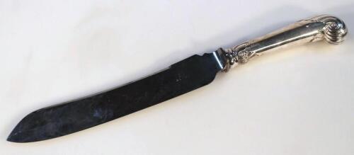 An Edwardian silver handled carving knife