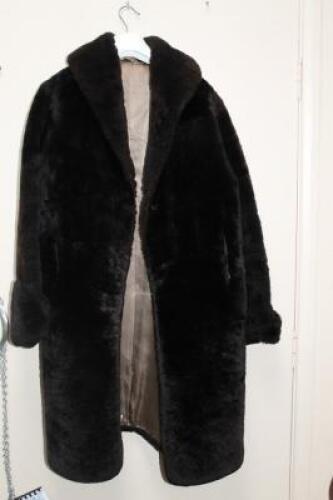 A 20thC three quarter length fur finished coat