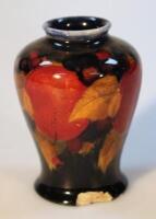 A Moorcroft blue Pomegranate pattern vase