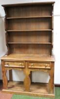 A 20thC light elm dresser