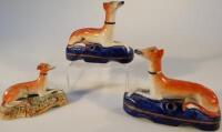 A pair of 19thC Staffordshire greyhound inkwells