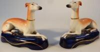 A pair of 19thC Staffordshire greyhound inkwells