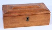 An early 20thC oak tea caddy