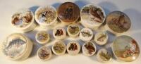 A quantity of 19thC Prattware and other pot lids