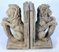 A pair of terracotta finish bookends