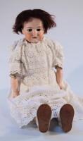 An Armand Marseille 370 5 DEP bisque headed doll