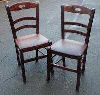 Eight various hardwood dining chairs