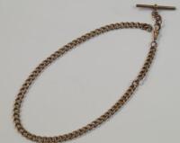 An Edwardian 9ct rose gold T bar watch chain