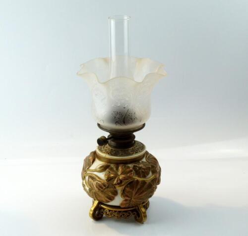 An Art Nouveau Royal Worcester paraffin lamp