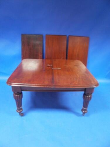 An early Victorian mahogany extending dining table