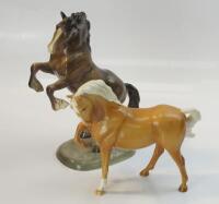 Two Beswick horses