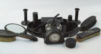 An early 20thC ebony part dressing table set