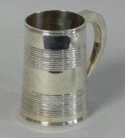 A George III Scottish silver cylindrical tapering mug