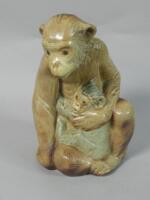 A large Lladro porcelain figure of a chimpanzee and baby