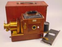 A late 19thC mahogany and brass magic lantern