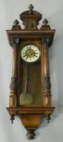 A late 19thC Vienna walnut cased wall clock