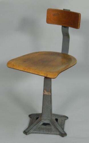 An early to mid 20thC Singer machinist's chair