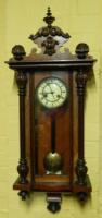 A 19thC Vienna walnut wall clock