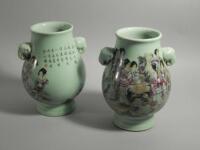 A pair of modern Chinese celadon glazed two handled vases