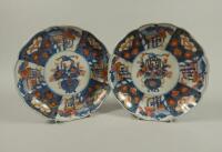 A pair of late 19thC Japanese Imari small saucer dishes