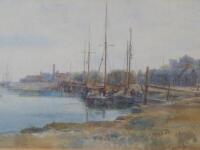 Early 20thC English School. A river scene with quayside and moored boats