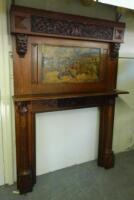 An early 20thC oak fire surround