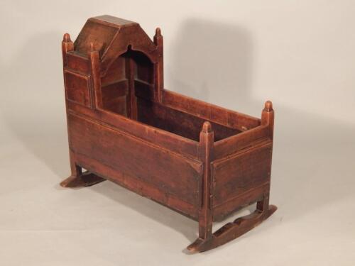 An early 18thC fruitwood child's crib