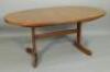 A G-Plan teak retro extending dining table