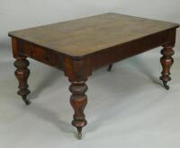 A Victorian oak kitchen table