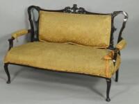 An Edwardian mahogany salon type sofa