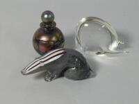 Three glass paperweights