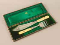 A pair of Victorian silver and ivory fish servers