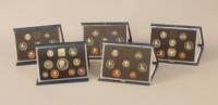 Five United Kingdom Royal Mint proof coin sets