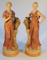 A pair of late 19thC Royal Dux figures