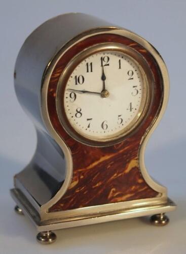 An Edwardian silver plated travel clock