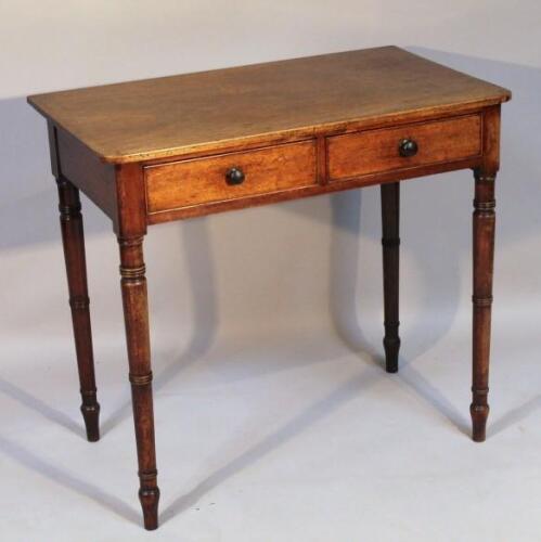 An early 19thC mahogany side table