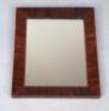 A rosewood framed hanging mirror