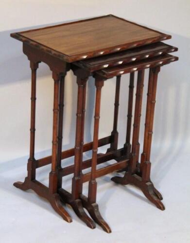 A nest of three late 19thC mahogany tables