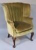 A 19thC George I style walnut framed porter's chair