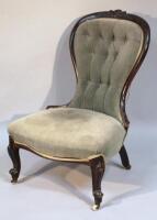 A Victorian mahogany nursing chair