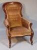 A Victorian mahogany open armchair