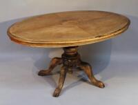 A Victorian walnut loo table